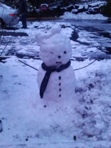 Snowgirl with scarf and bow